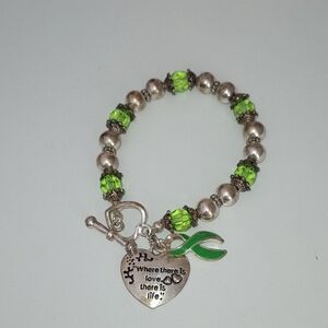 Beautiful Green And Silver Beads Bracelet With Charms.